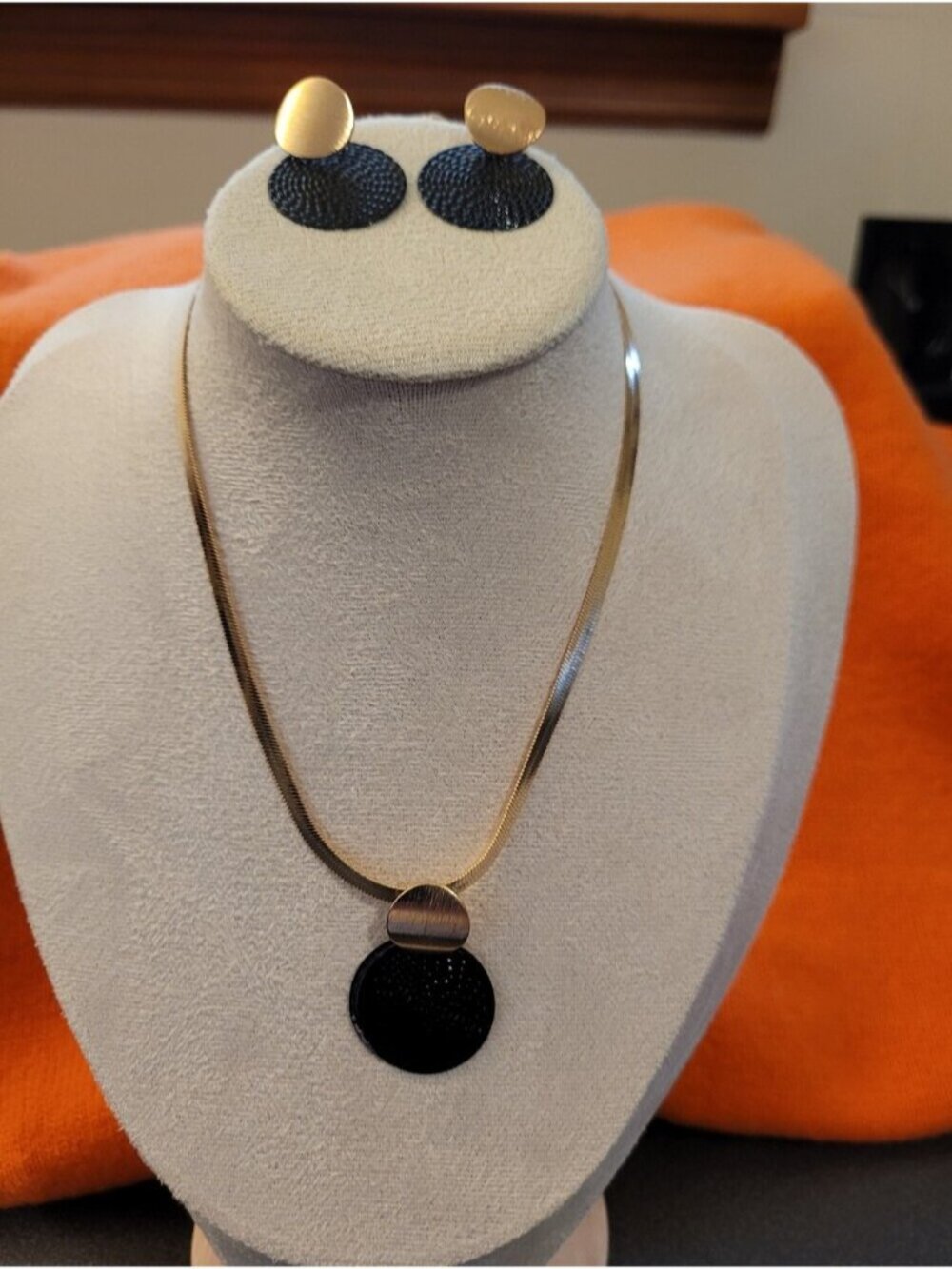 Gold Tone and Black Disc Pendant Necklace and Earring Set